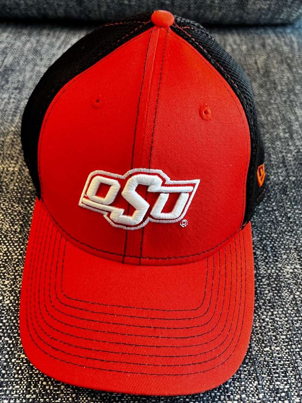 New Era orange/black baseball hat with OSU in white and O State on back